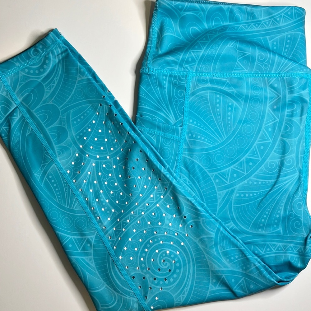 CVG Turquoise capris - large. Never been worn.  Practical new